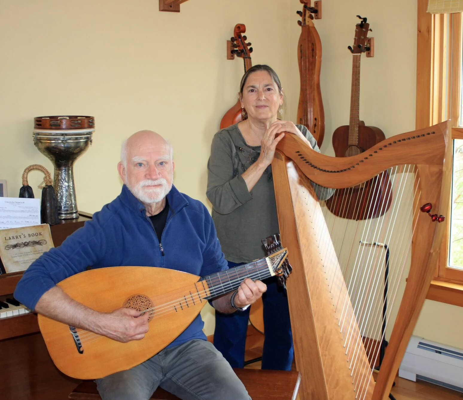Kathy Light with harp and Steven Light with lute
